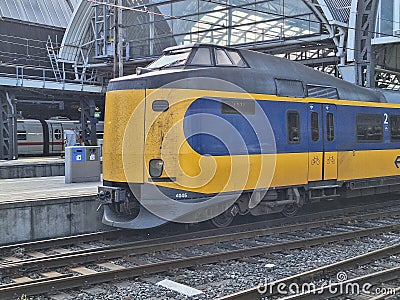 ICM koploper intercity train arrives at Amsterstam Central Station Editorial Stock Photo