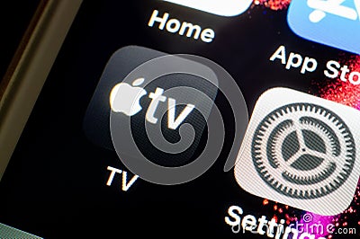Icon of Apple TV application on Apple iPhone smartphone Editorial Stock Photo