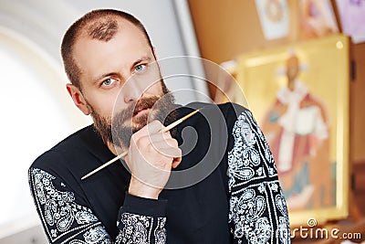 Icon painting iconographer portrait Stock Photo