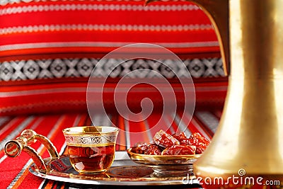 Iconic Abrian fabric tea and dates symbolise Arabian hospitality Stock Photo