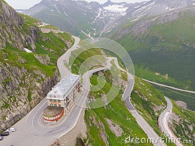 Iconic Belvedere hotel on Furkpass mountain road in Swiss Alps close to Obergoms, Switzerland. Editorial Stock Photo