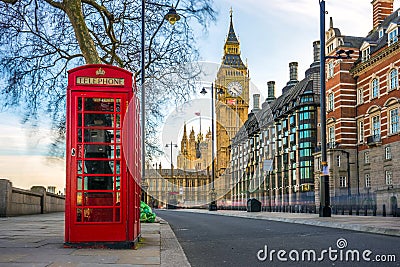 The iconic British old red telephone box with Big Ben, London Stock Photo