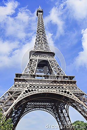 Iconic Eiffel Tower against a blue sky with clouds, Paris, France Stock Photo