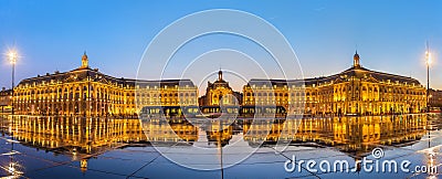 Iconic panorama of Place de la Bourse with tram and water mirror fountain in Bordeaux, France Stock Photo