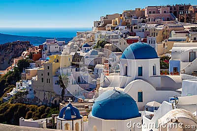 Iconic Photo of Blue Domed Churches and Buildings of Santorini Stock Photo