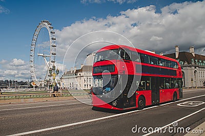 Iconic red double decker bus in London, UK. The London Bus is one of London`s principal icons, the archetypal red Editorial Stock Photo