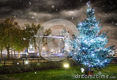 The iconic Tower Bridge in winter time with a christmas tree Stock Photo