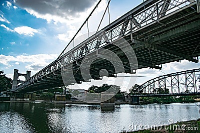 Dueling bridges over the Brazos river in Waco Texas Stock Photo