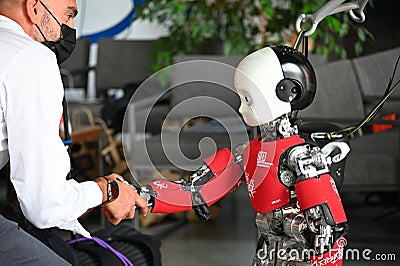 ICub is a research-grade humanoid robot designed by IIT to help developing and testing embodied AI algorithms Editorial Stock Photo