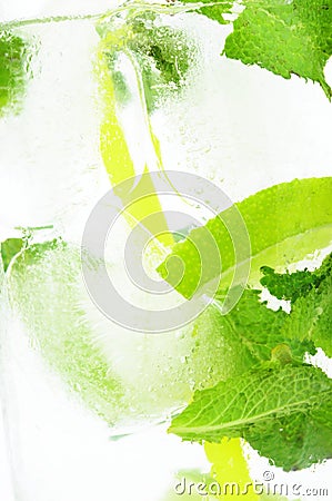 Icy background macro drink ice cubes mint limes Stock Photo