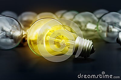 Idea concept with incandescent light bulbs Stock Photo