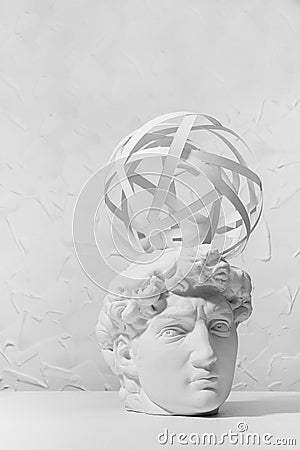 Idea concept with thinking head of white antique statue David and abstract image of his thoughts as swirl or paths of electron. Stock Photo