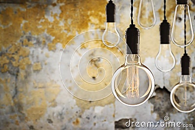 Idea and leadership concept Vintage incandescent Edison bulbs on Stock Photo
