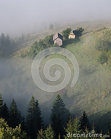 Idealistic view of a secluded house in the mountains Stock Photo