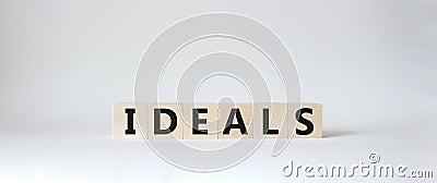 Ideals symbol. Wooden blocks with word Ideals. Beautiful white background. Business and Ideals concept. Copy space Stock Photo