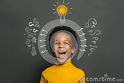 Ideas and brainstorm concept. Happy child school student with lightbulb and chalk question marks Stock Photo