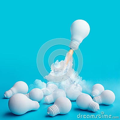 Ideas inspiration concepts with rocket lightbulb flying on group of another lightbulb Stock Photo
