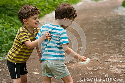 Identical twins fight Stock Photo