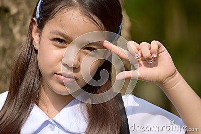 An Idiotic Female Student With Books Stock Photo