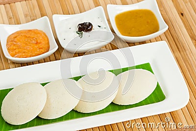 Idly / Idli with tomato & coconut chutney and sambar Stock Photo