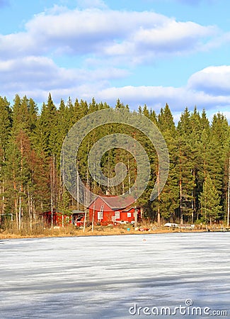 Finland, Savonia: Cabin at a Frozen Lake Stock Photo