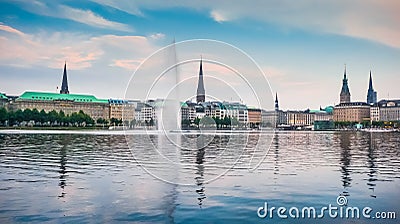 Idyllic Binnenalster in golden evening light at sunset, Hamburg, Germany Stock Photo