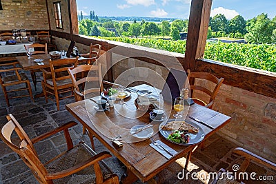 Idyllic breakfast table with a nice view in the nature Stock Photo