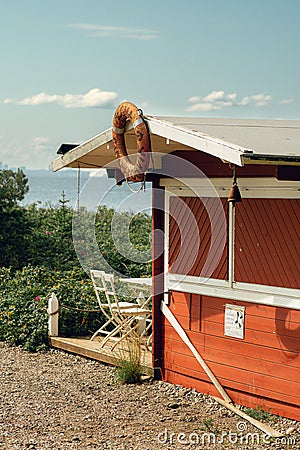 Idyllic and charming cabin by the sea, a perfect place to unwind Stock Photo