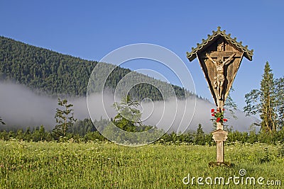 Idyllic cross in Jachenau Stock Photo