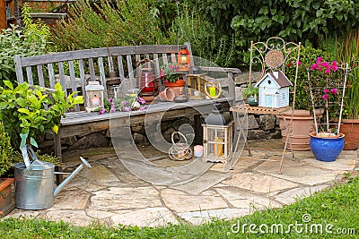 Idyllic garden place with different lanterns Stock Photo