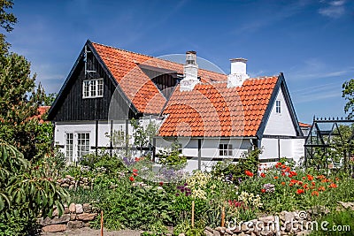 Idyllic half-timbered house on Bornholm Stock Photo