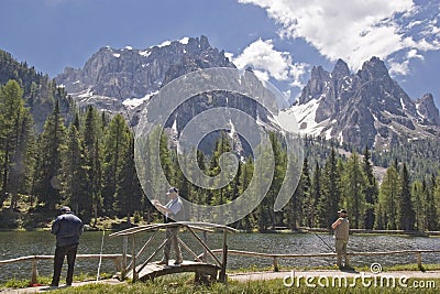 Fishing pleasure on the Antorno lake Editorial Stock Photo