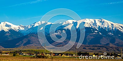 Idyllic landscape with the village of Porumbacu de Sus - Romania and in the background Stock Photo