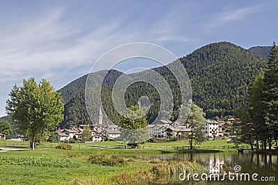 Lake Buse and village Brusago Stock Photo