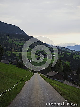 Idyllic rural remote swiss countryside alpine mountain landscape panorama in Wildhaus Toggenburg St Gallen Switzerland Stock Photo