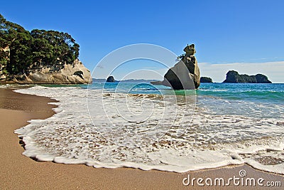 Idyllic sand beach on Coromandel peninsula Stock Photo