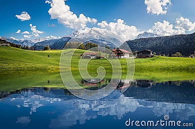 Idyllic summer landscape with clear mountain lake in the Alps Stock Photo