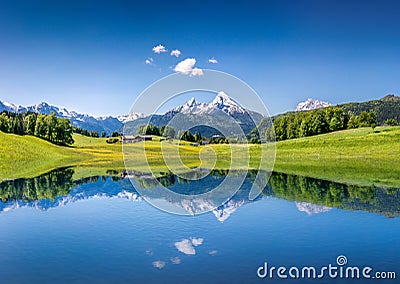 Idyllic summer landscape with mountain lake in the Alps Stock Photo