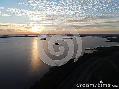 Idyllic sunset over a vast body of water in Kemi, Finland Stock Photo