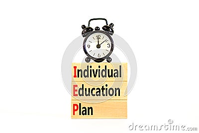 IEP individual education plan symbol. Concept words IEP individual education plan on wooden blocks on beautiful white table white Stock Photo