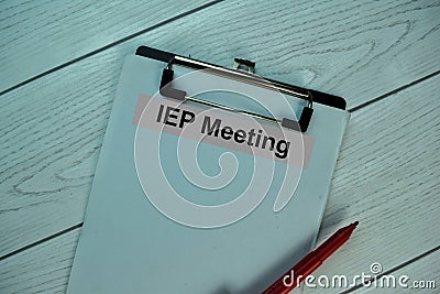 IEP Meeting write on a paperwork isolated on office desk Stock Photo