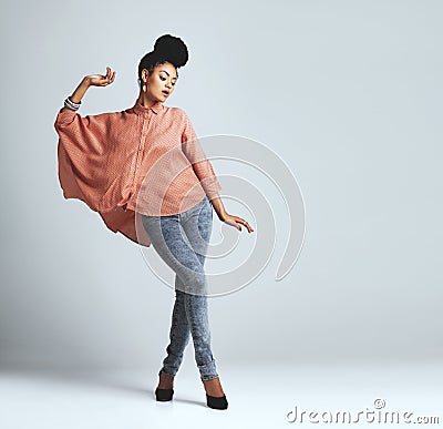 If theyre jealous, youre doing something right. a fashionable young woman wearing a casual outfit. Stock Photo