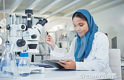 If you dont know, get a scientist on it. a young scientist conducting research in a laboratory. Stock Photo