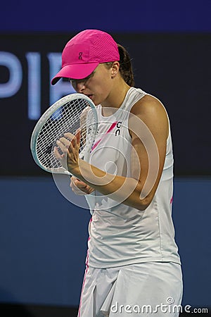 Iga Swiatek of Poland in action during round of 16 match against Ekaterina Alexandrova of Russia at 2024 Miami Open Editorial Stock Photo