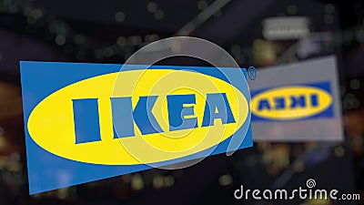 Ikea logo on the glass against blurred business center. Editorial 3D rendering Editorial Stock Photo