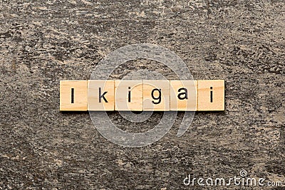 ikigai word written on wood block. ikigai text on table, concept Stock Photo