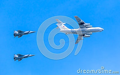 Il-78 (Midas) aerial tanker demonstrates refueling of 2 MiG-31 Editorial Stock Photo