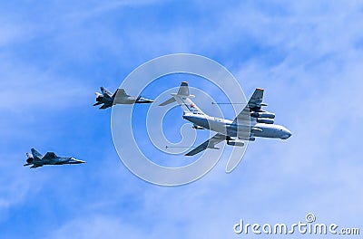 Il-78 (Midas) aerial tanker demonstrates refueling of 2 MiG-31 (Foxhound) Editorial Stock Photo