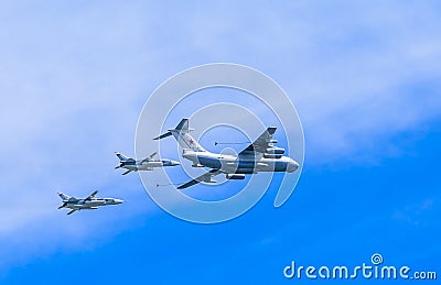 Il-78 (Midas) aerial tanker demonstrates refueling of 2 Su-24 (Fencer) Editorial Stock Photo