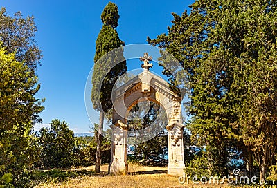 Ile Saint Honorat island with arch shrine of Abbaye de Lerins monastery at Mediterranean Sea offshore Cannes in France Editorial Stock Photo